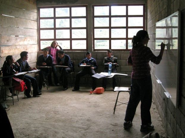 Dr. Oyanedel-Craver teaching at a local high school in San Mateo Ixtatan Guatemala